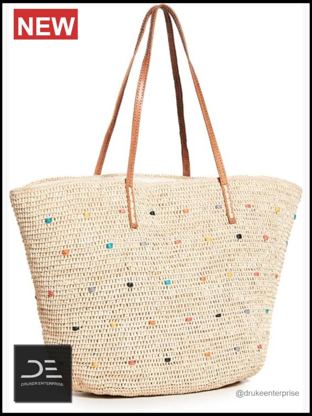 Raffia woven tote with leather straps, magnetic snap closure, interior patch